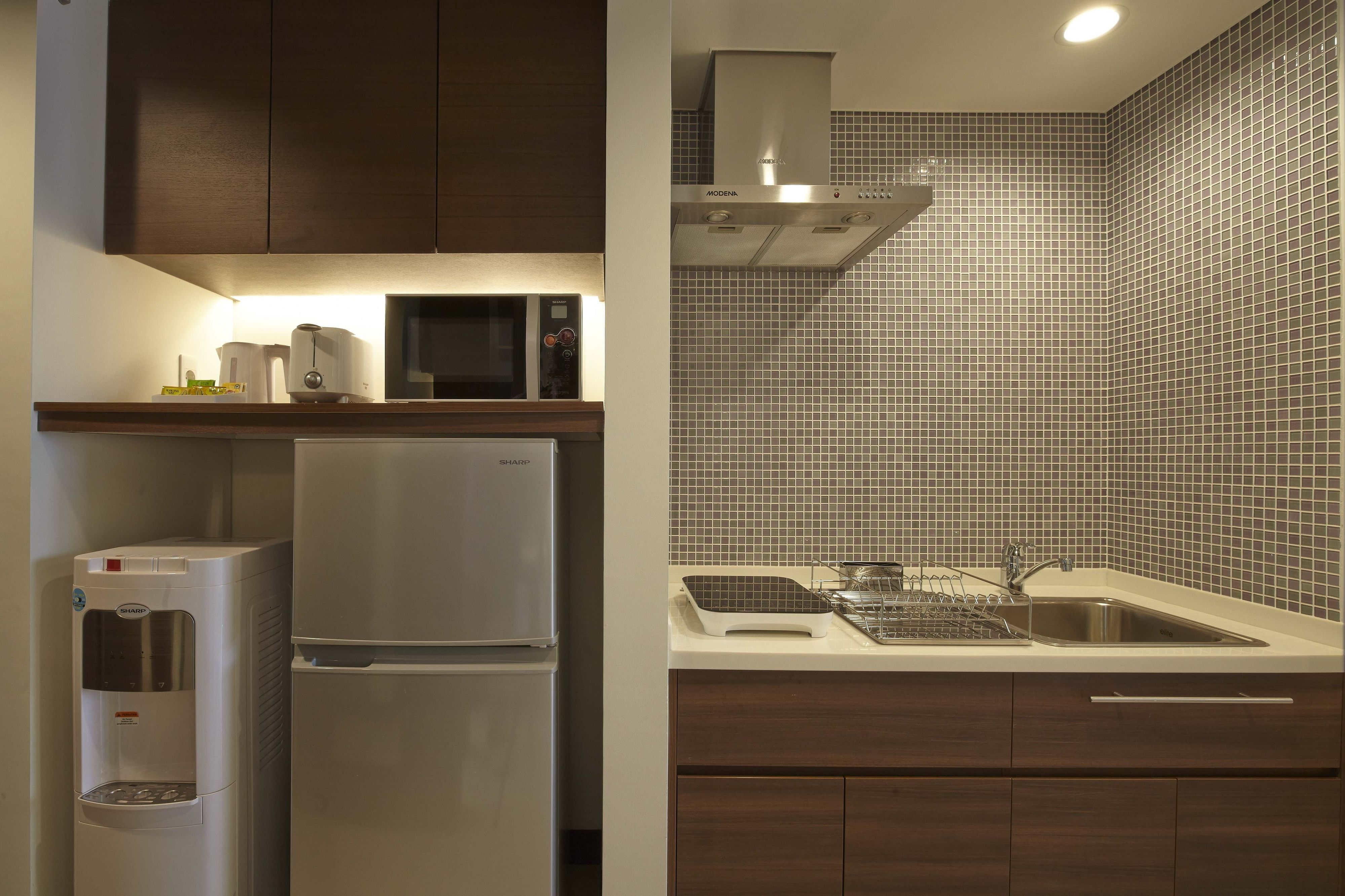 fridge, microwave, electric kettle, cookware/dishes/utensils