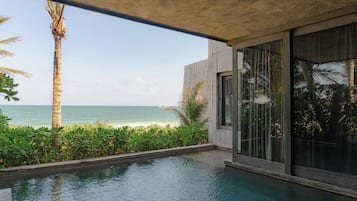 Suite, 1 kingsize bed, uitzicht op zee | Uitzicht op strand/zee