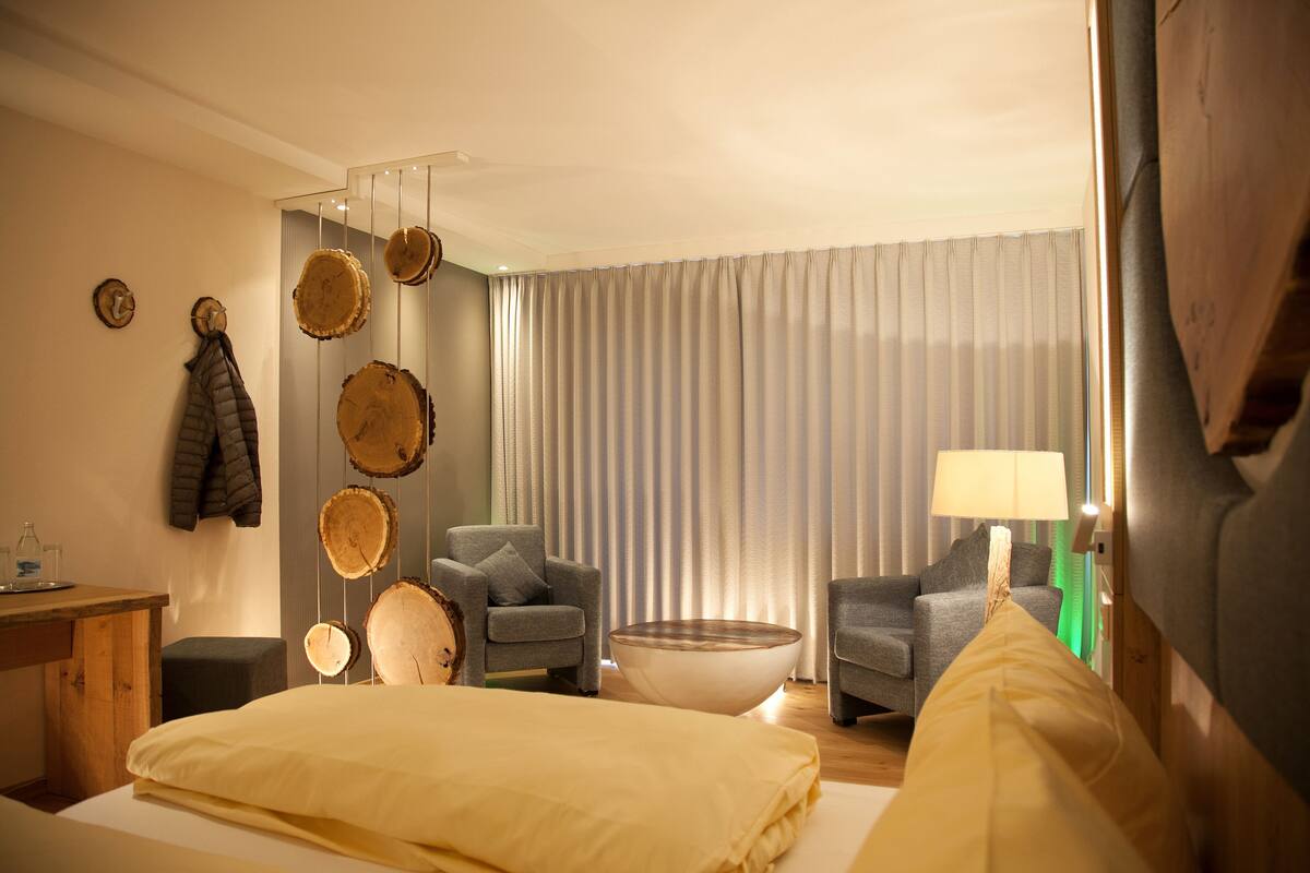 premium double room (comfort) | 1 bedroom, in-room safe, individually decorated, desk