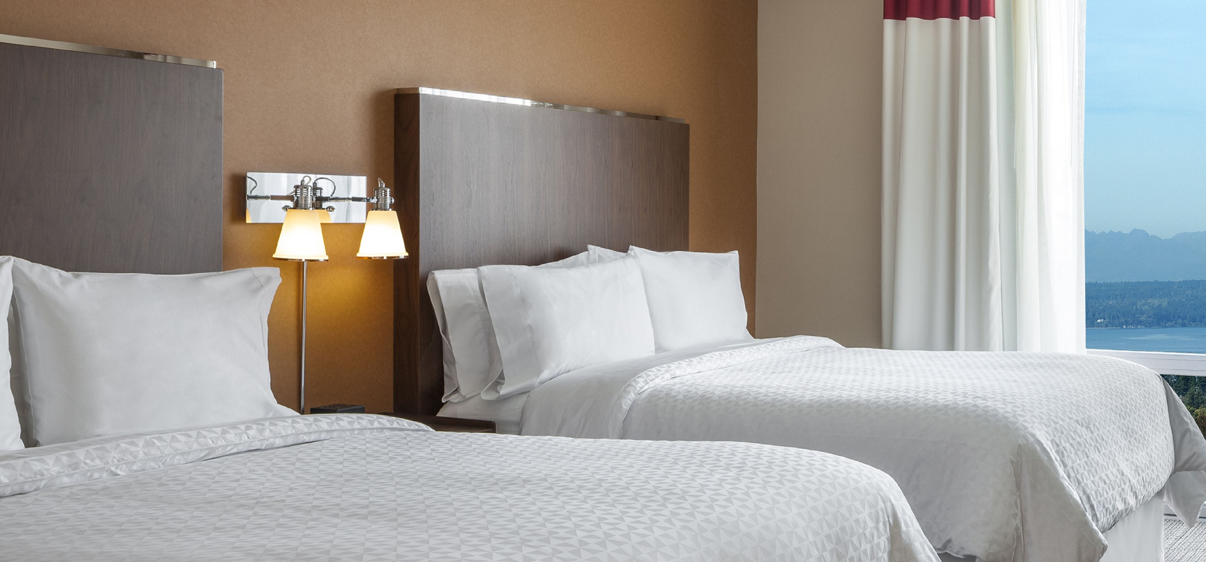 room, 2 queen beds | 1 bedroom, hypo-allergenic bedding, pillow-top beds, in-room safe