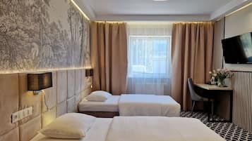 Hypo-allergenic bedding, desk, laptop workspace, iron/ironing board
