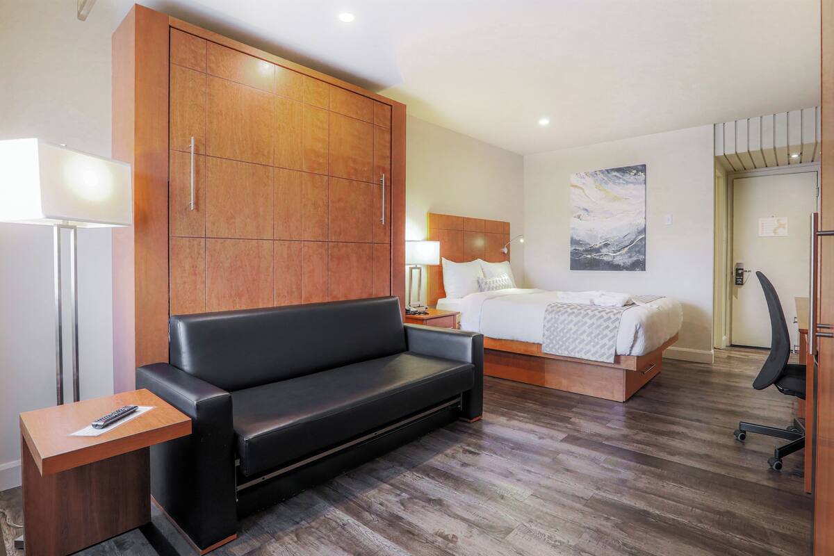 premium bedding, desk, blackout curtains, soundproofing