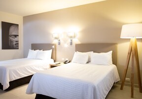 Executive Room, 2 Double Beds | In-room safe, desk, laptop workspace, blackout drapes