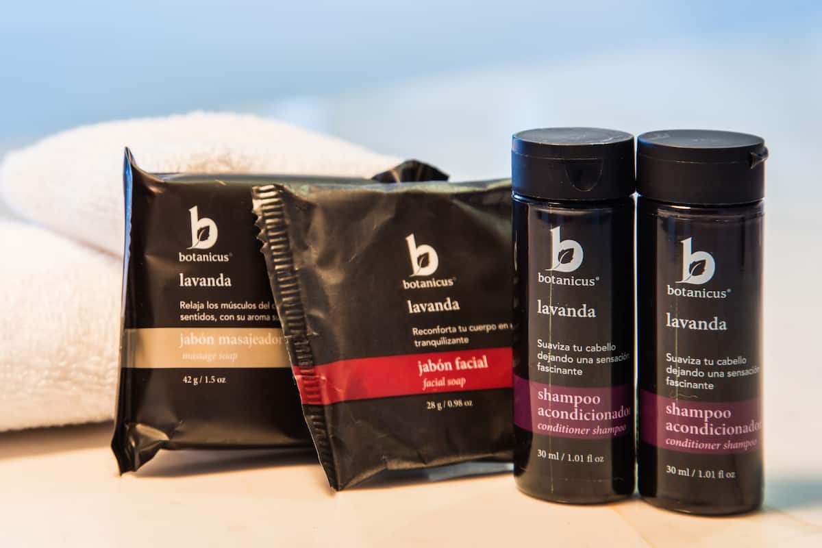 A set of Botanicus lavender products including a facial soap, conditioner shampoo, and a massage soap.
