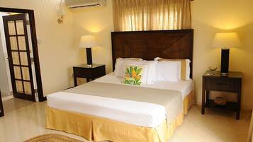 Deluxe Villa, 4 Bedrooms | 3 bedrooms, in-room safe, individually decorated, desk