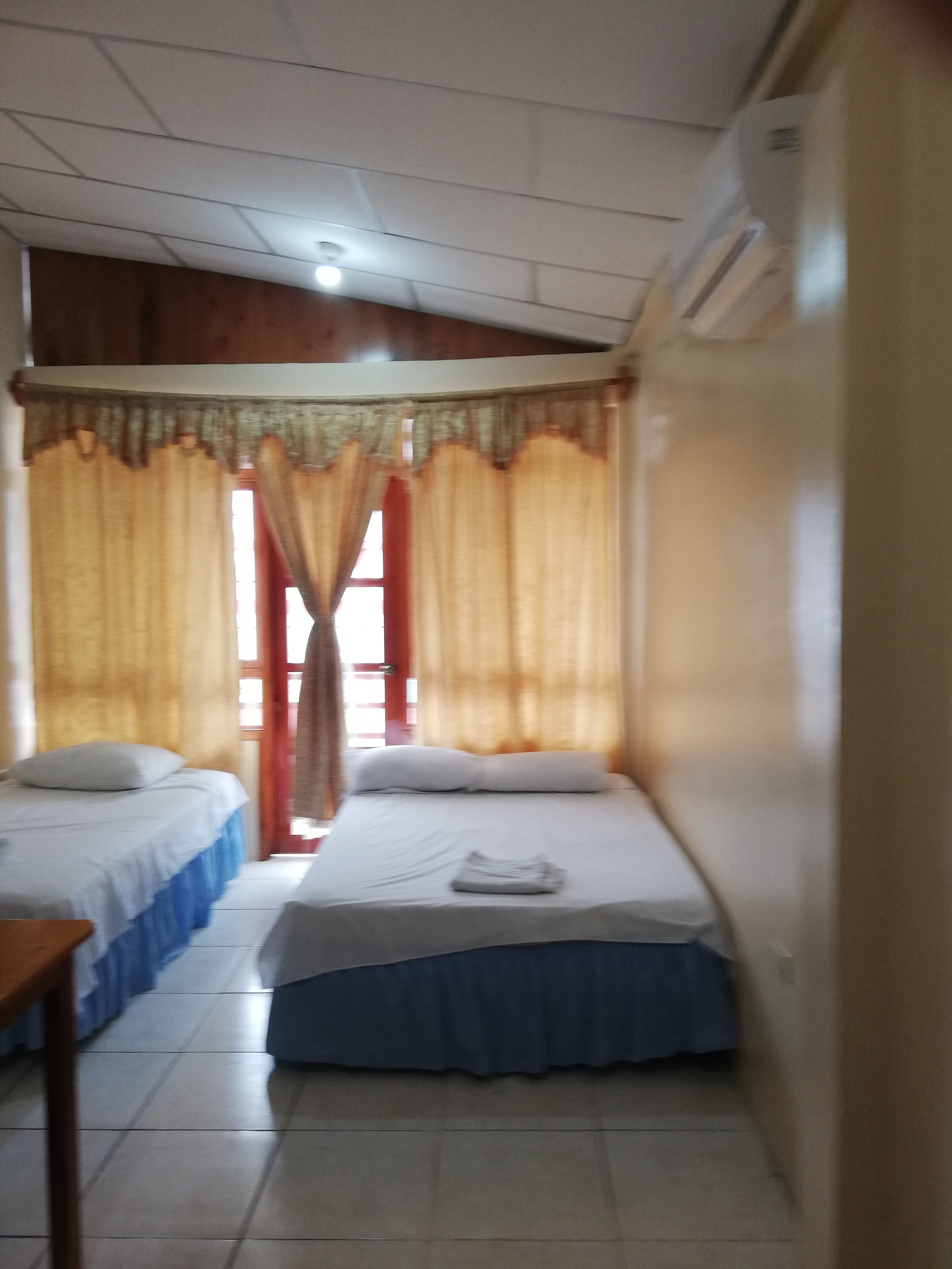 Standard Triple Room, 1 Bedroom, Private Bathroom | Desk, free WiFi, bed sheets, wheelchair access