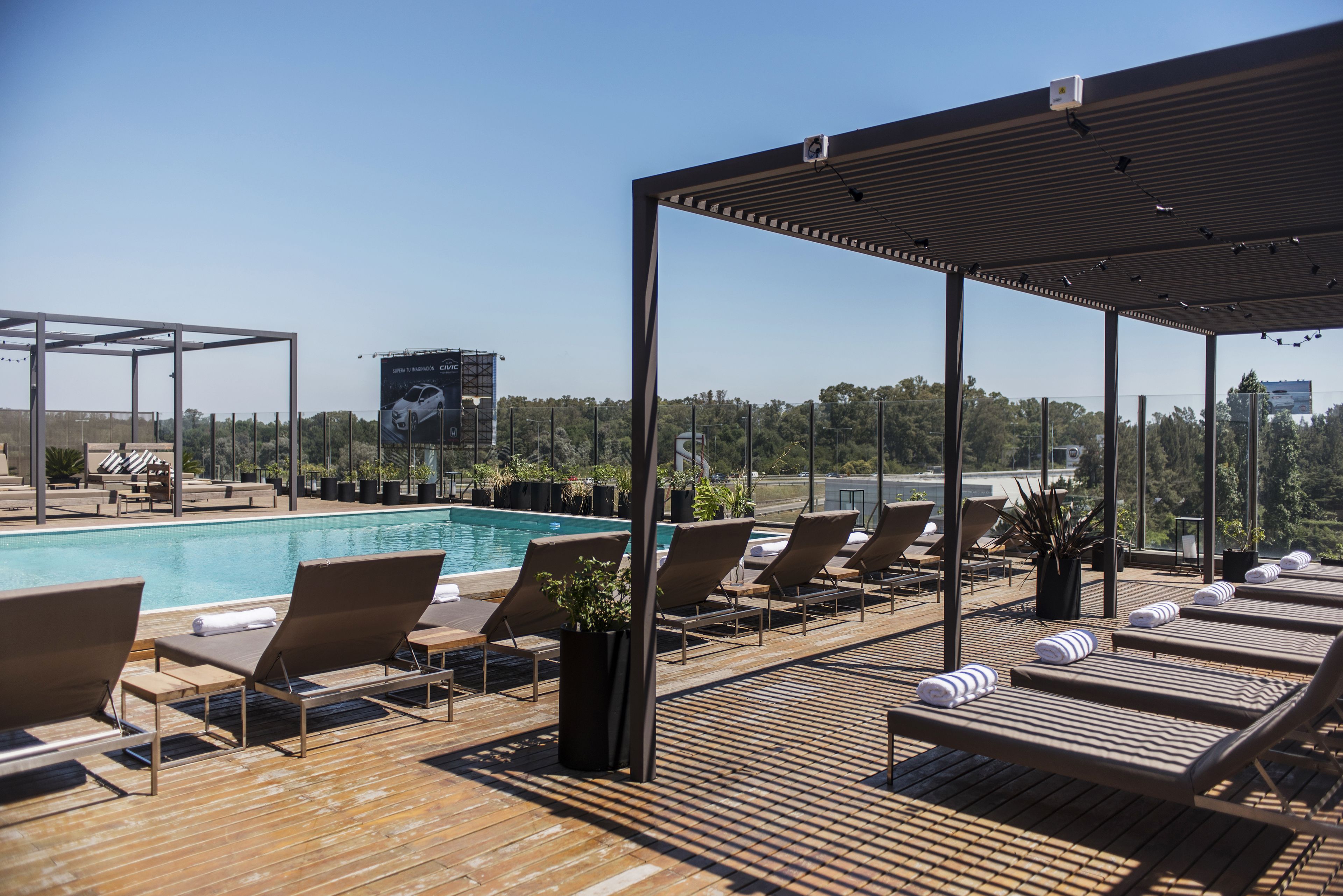 Outdoor pool, open 9:00 AM to 8:00 PM, pool umbrellas, sun loungers