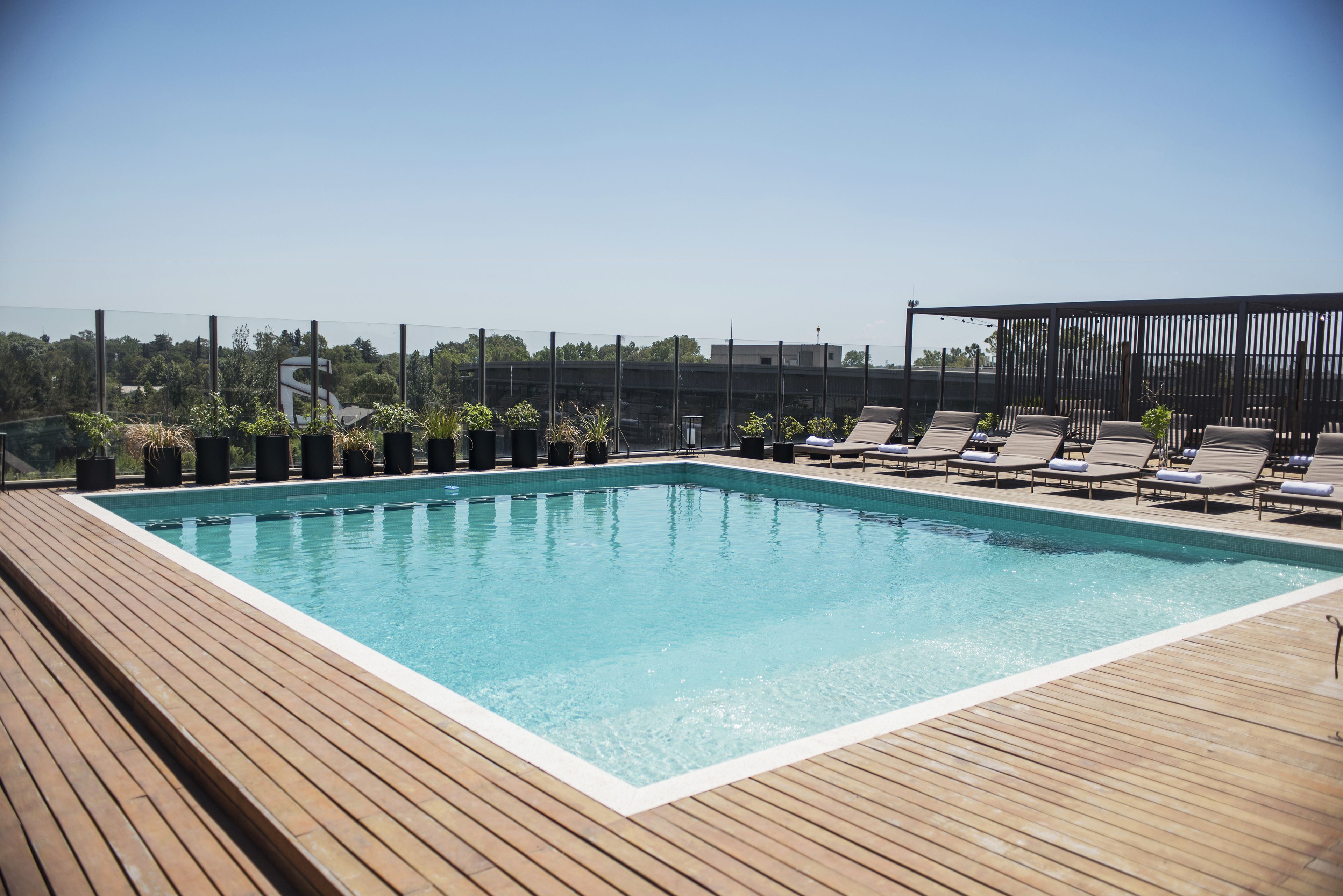 Outdoor pool, open 9:00 AM to 8:00 PM, pool umbrellas, sun loungers