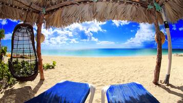 Private beach, white sand, free beach cabanas, sun-loungers