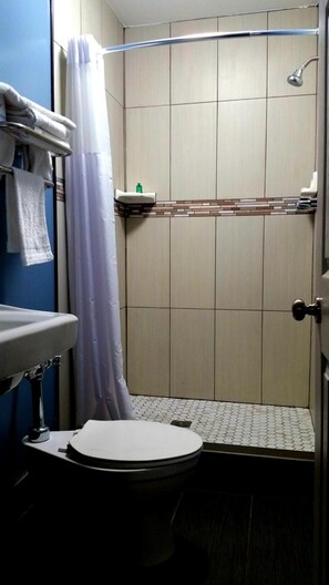 Shower, towels, soap, shampoo