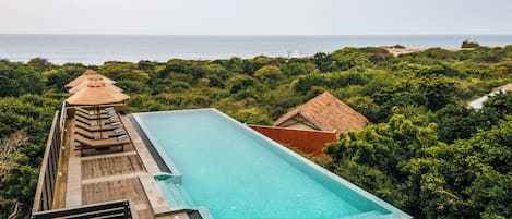 Outdoor pool, pool umbrellas, pool loungers