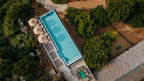 Outdoor pool, pool umbrellas, pool loungers