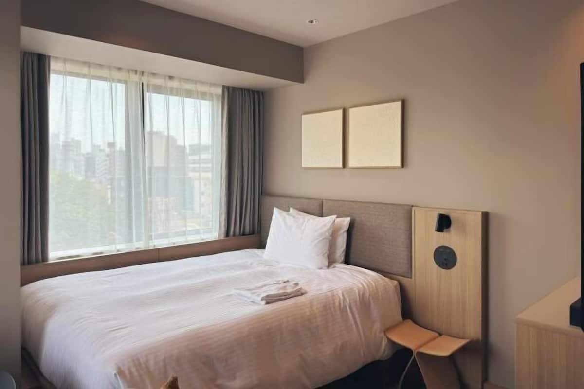 1 bedroom, desk, blackout drapes, iron/ironing board