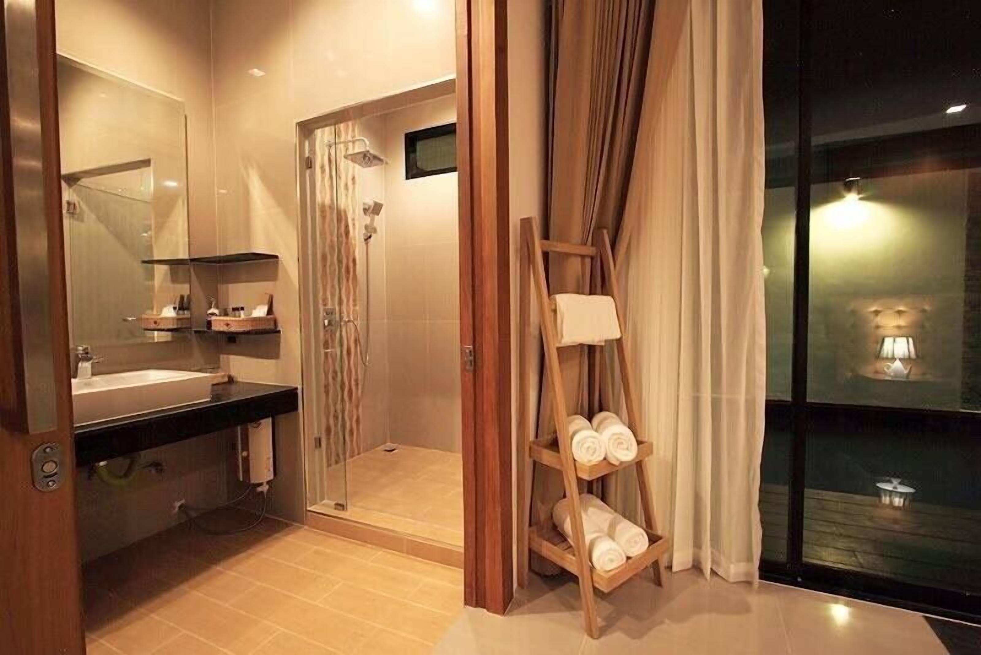 garden pool villa | bathroom | shower, free toiletries, hair dryer, towels