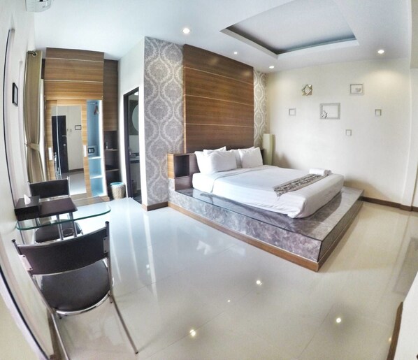 Deluxe Pool Villa | Minibar, in-room safe, desk, free WiFi