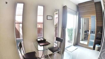 Deluxe Pool Villa | Minibar, in-room safe, desk, free WiFi