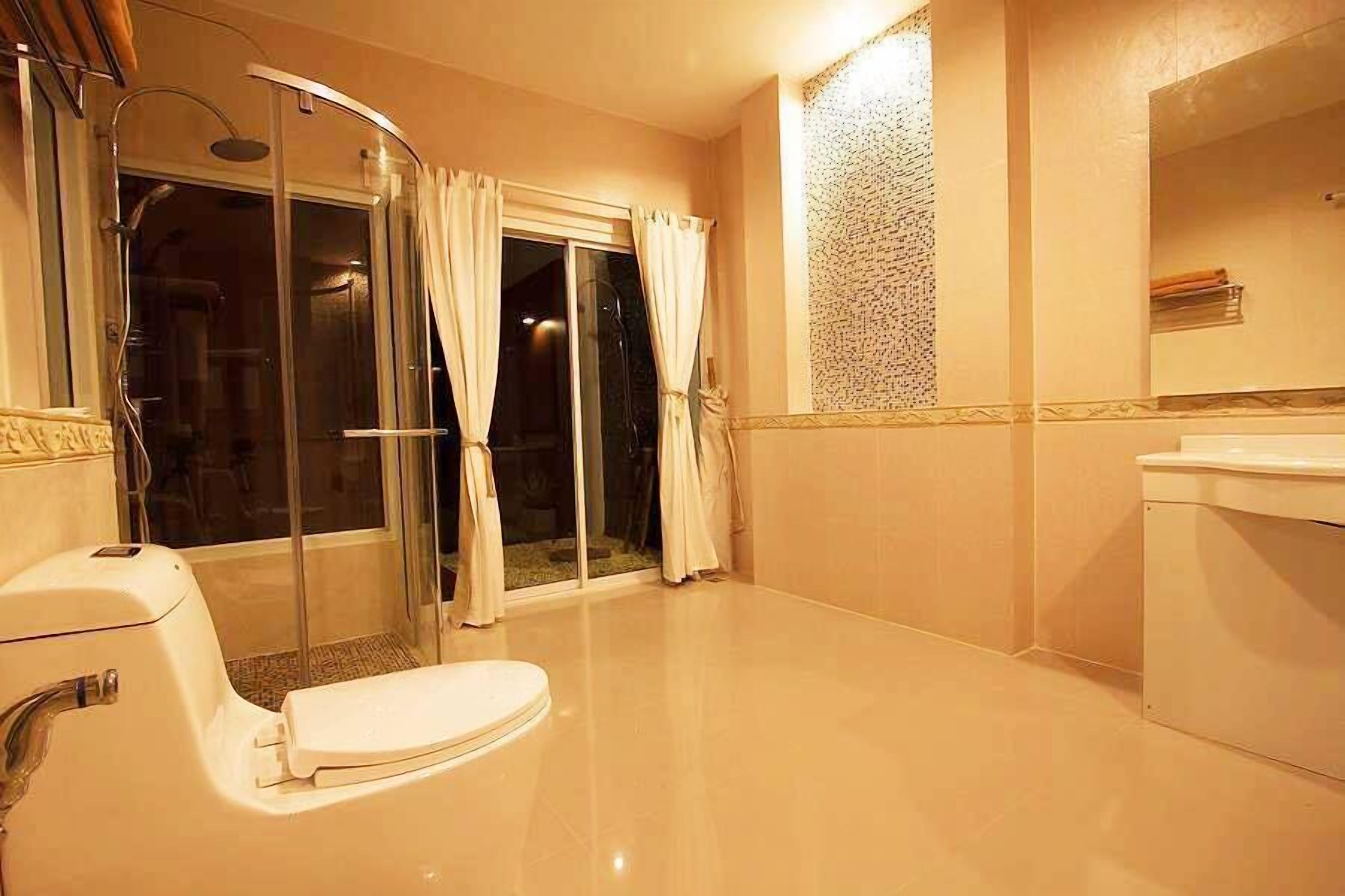 private pool villa | bathroom | shower, free toiletries, hair dryer, towels