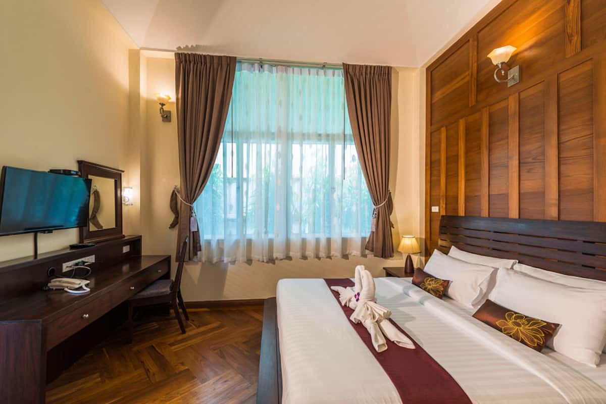 Vila família, 2 quartos | Roupas de cama premium, frigobar, cofres nos quartos, cortinas blackout