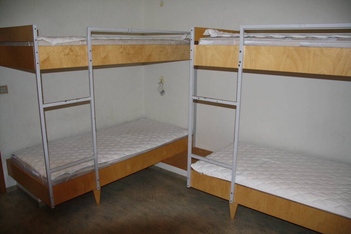 Basic Shared Dormitory, Multiple Beds | Desk, free cots/infant beds, rollaway beds