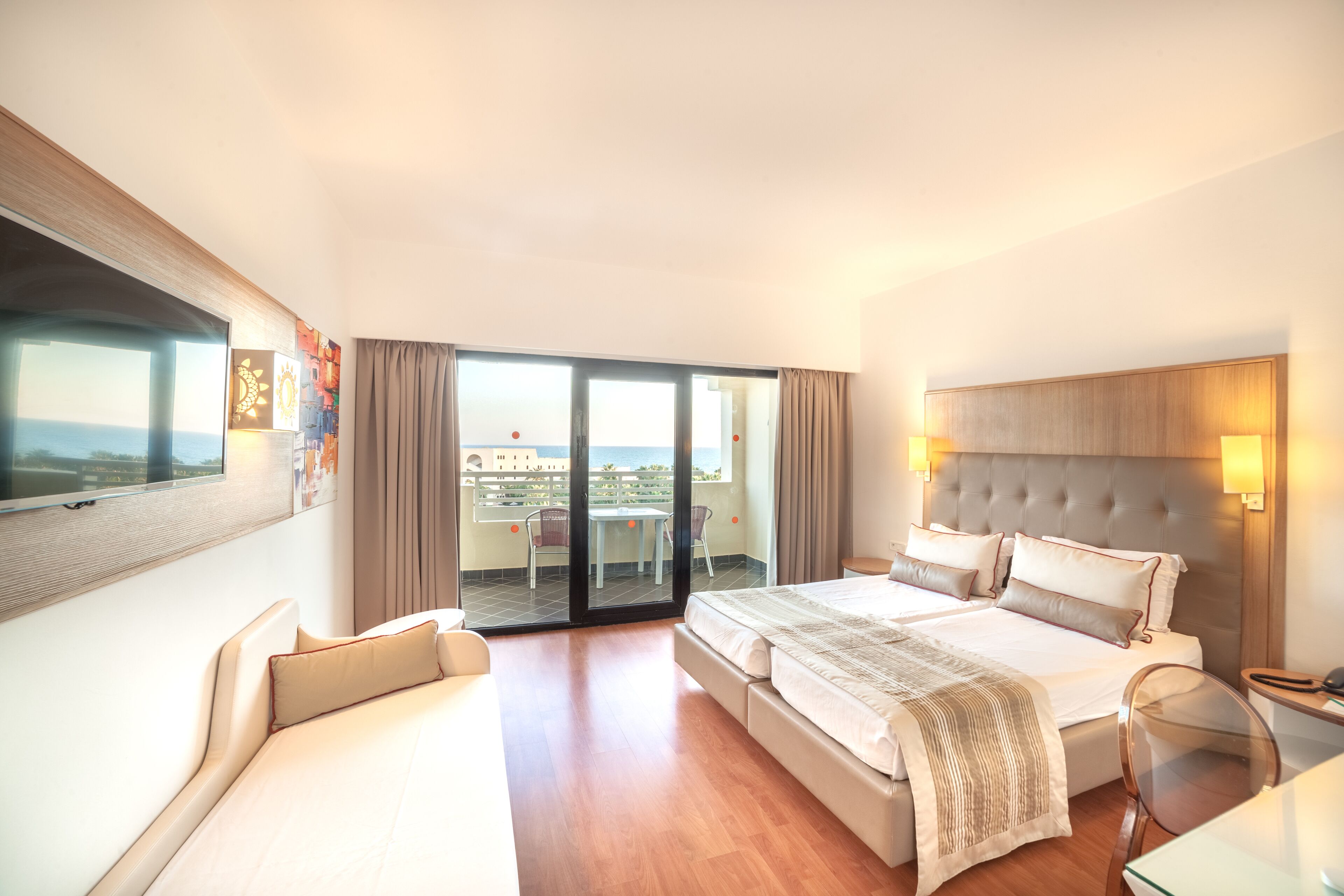 standard triple room, garden view | 1 bedroom, minibar, in-room safe, blackout curtains