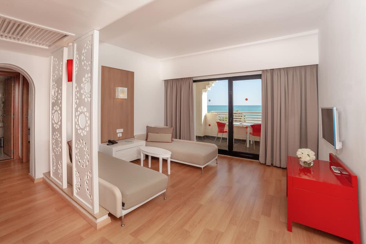 family room, sea view | 1 bedroom, minibar, in-room safe, blackout curtains