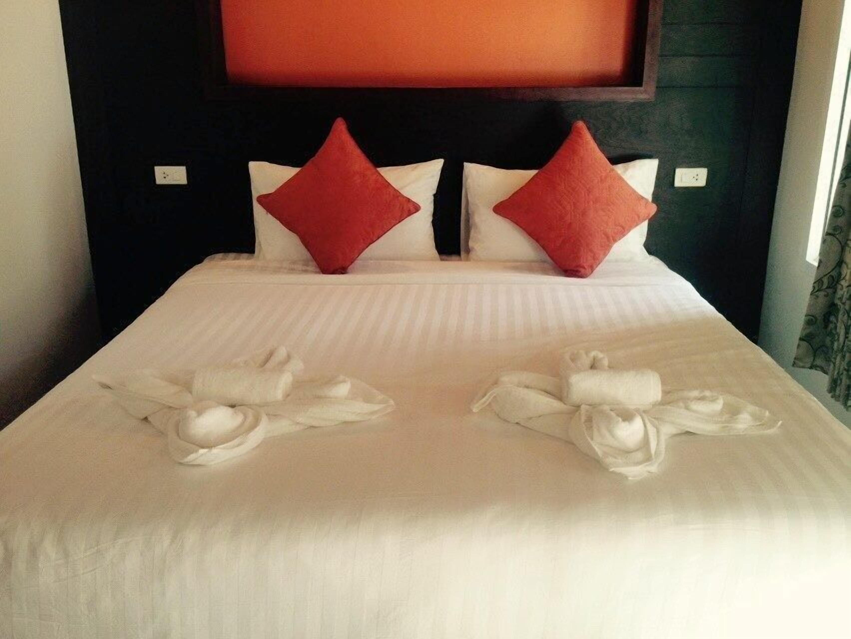 deluxe double bed with balcony and sea view | premium bedding, down duvets, free minibar, individually decorated