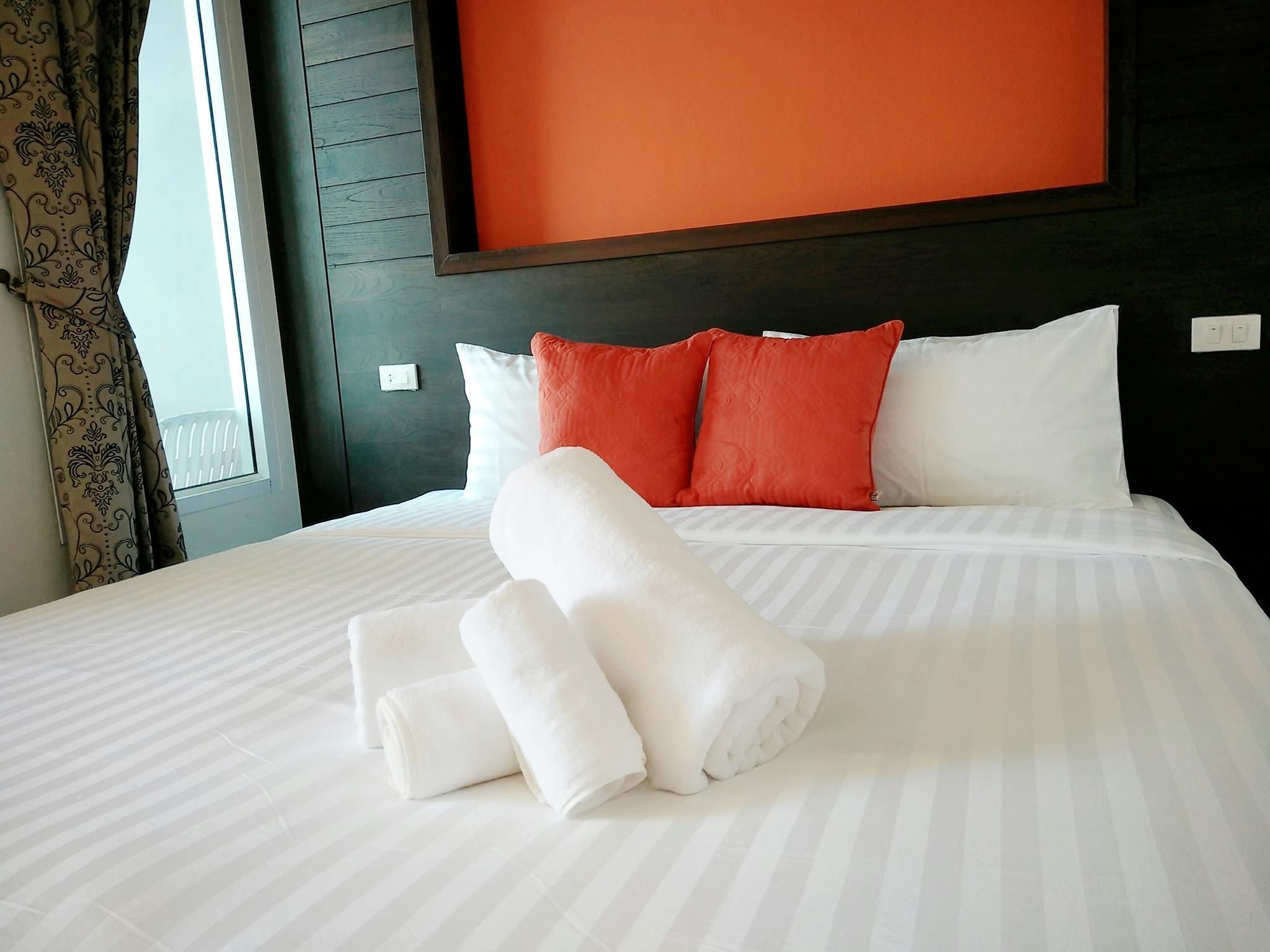 deluxe double bed with balcony and sea view | premium bedding, down duvets, free minibar, individually decorated