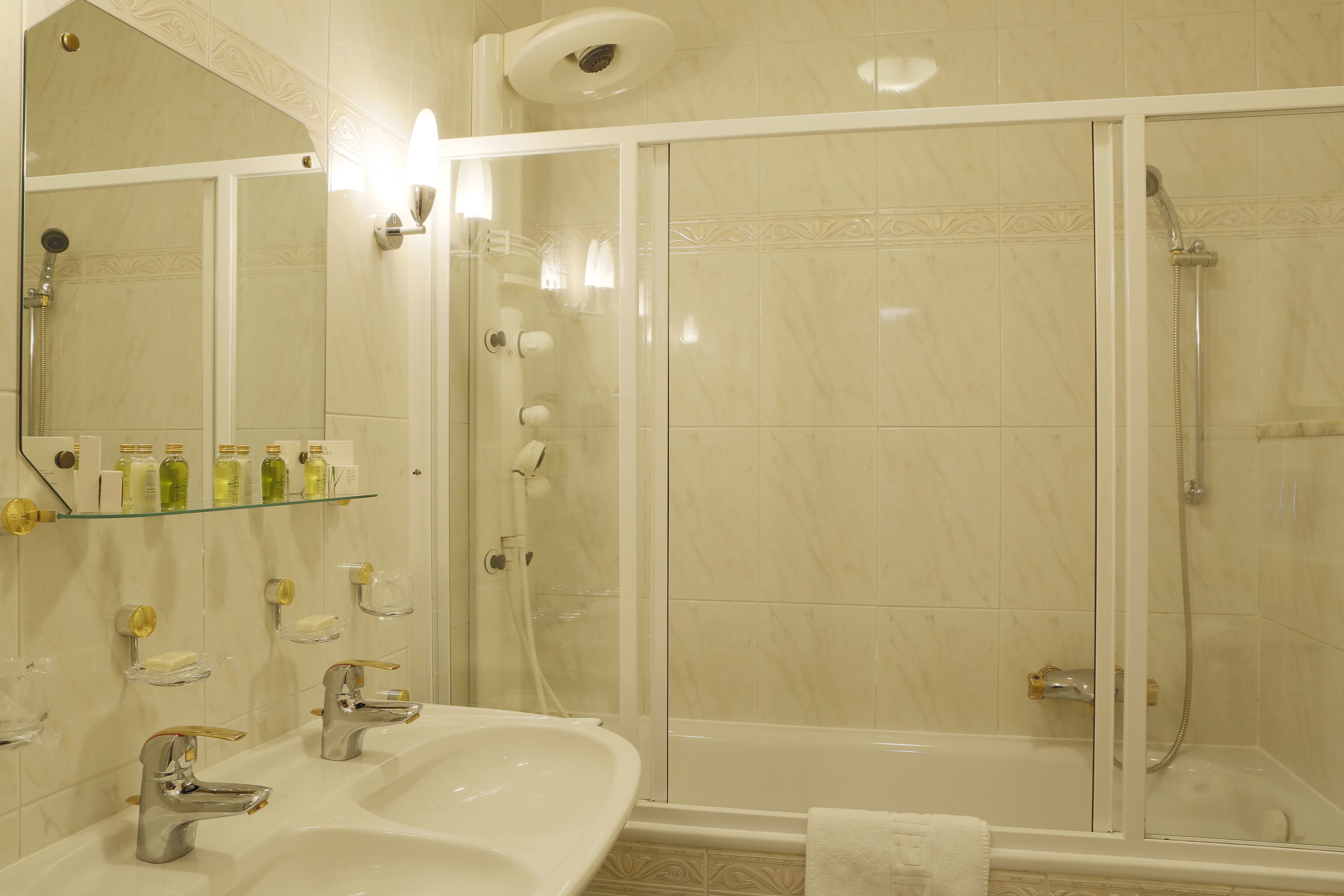 standard suite | bathroom | bathtub, designer toiletries, hair dryer, bathrobes