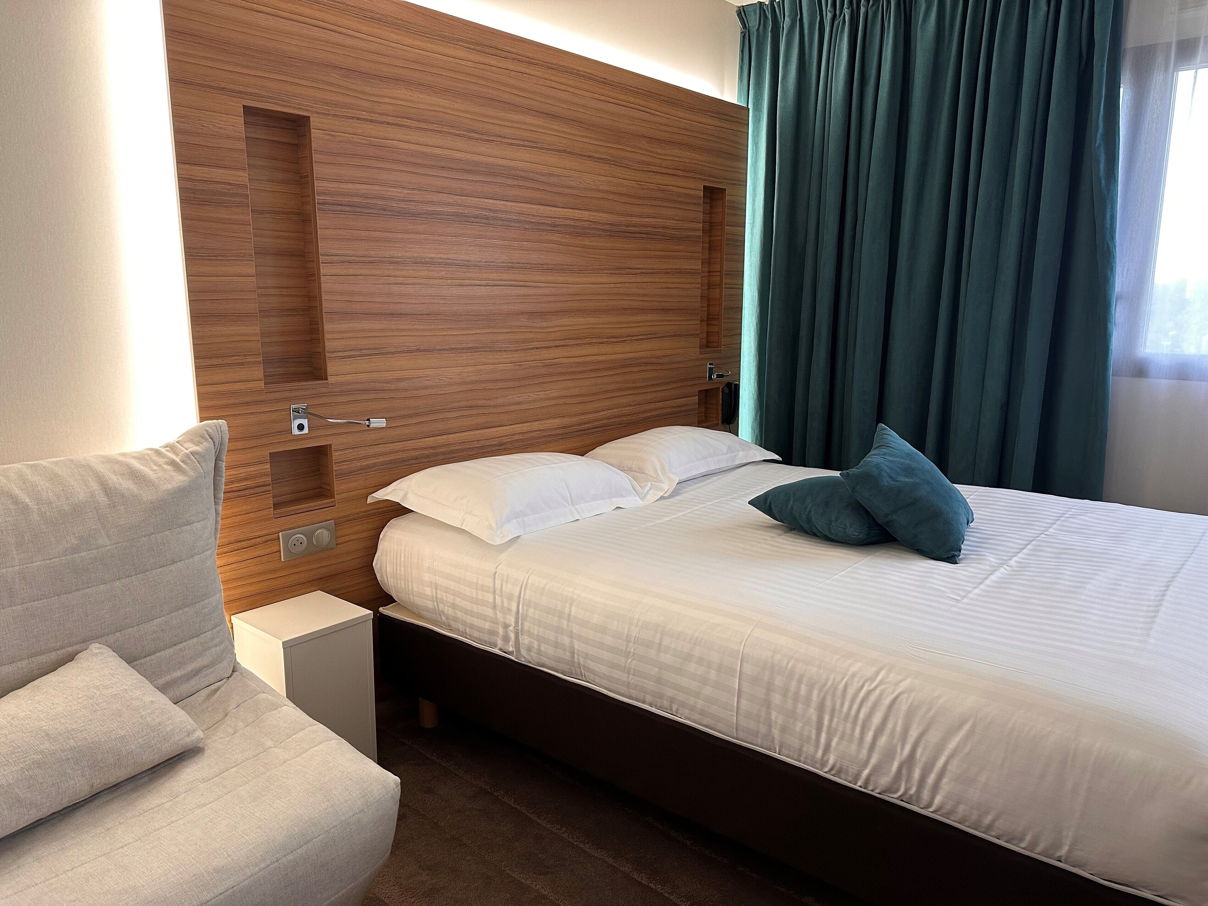 comfort triple room | premium bedding, desk, soundproofing, free cots/infant beds