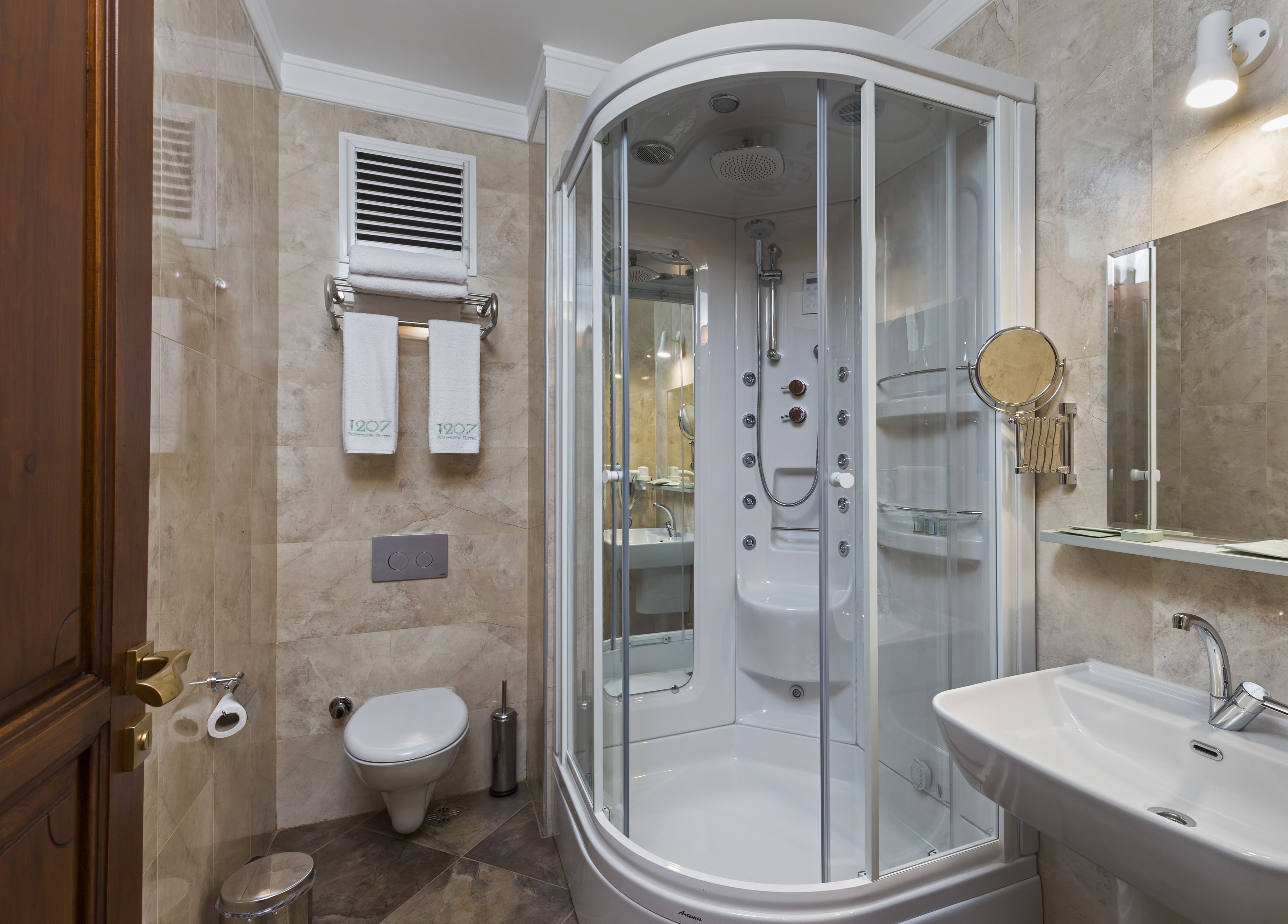 junior room, 1 queen bed with sofa bed, ensuite, city view | bathroom | shower, rainfall showerhead, free toiletries, hair dryer