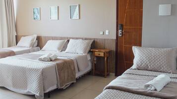 Deluxe Quadruple Room | Minibar, individually decorated, blackout curtains, free WiFi