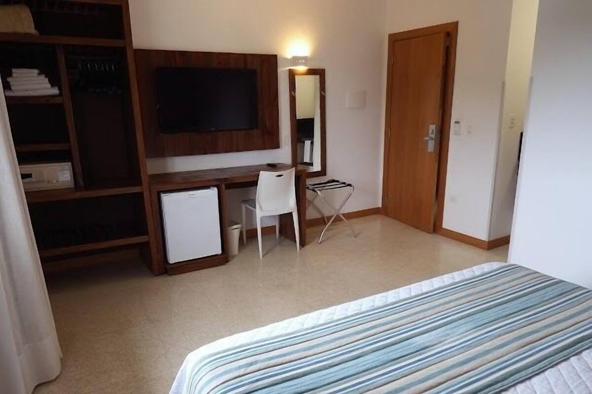 Standard Double or Twin Room | Minibar, individually decorated, individually furnished, blackout drapes