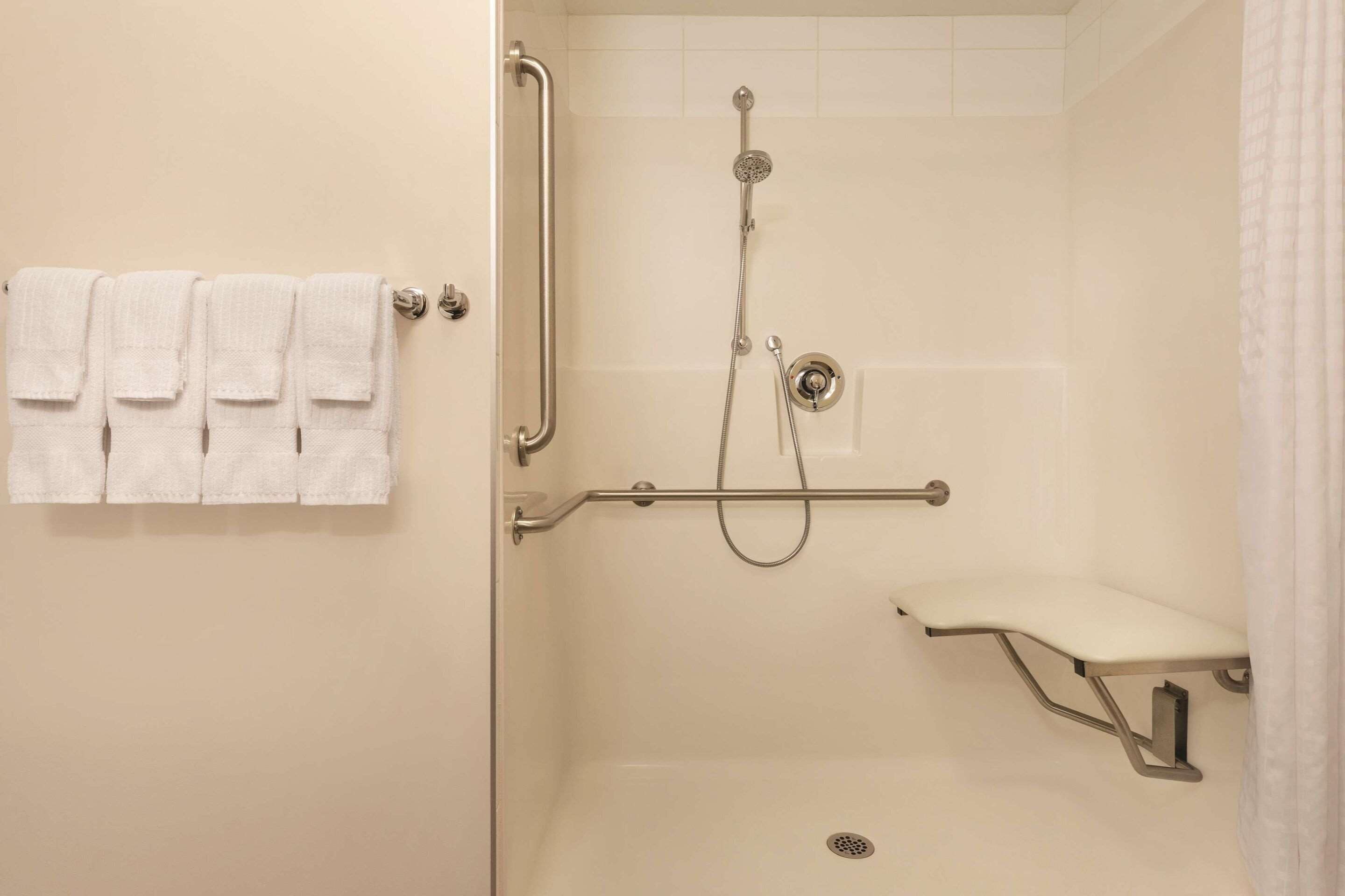 pillow-top beds, desk, laptop workspace, blackout curtains