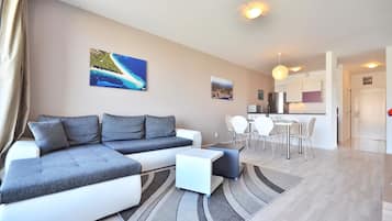 Apartment, 3 Bedrooms, Balcony, Sea View | Living area | Flat-screen TV
