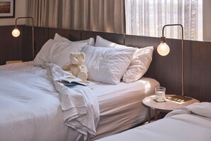 Colchones con pillow-top, minibar y caja de seguridad en la habitación