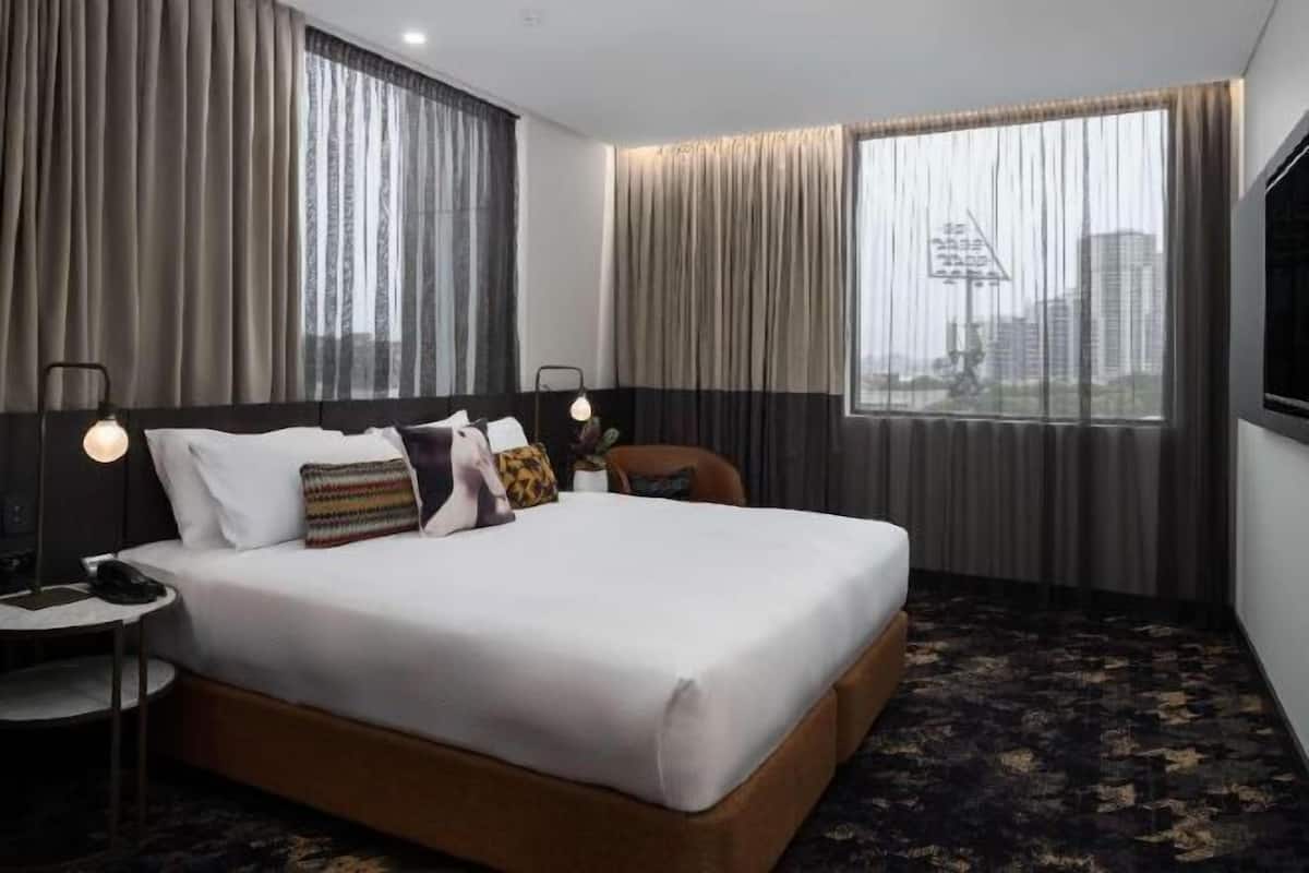 Colchones con pillow-top, minibar y caja de seguridad en la habitación