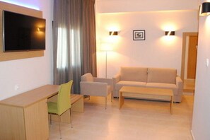 Suíte júnior | Área de estar | TV