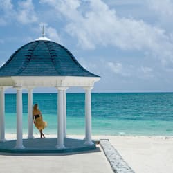 Relax under the gazebo, steps from the turquoise sea.