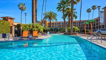 Outdoor pool, open 8:00 AM to 10:00 PM, pool umbrellas, sun loungers