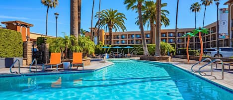 Outdoor pool, open 8:00 AM to 10:00 PM, pool umbrellas, sun loungers