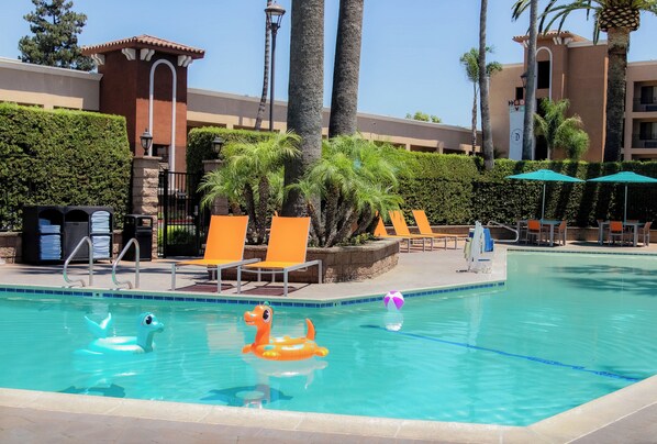 Outdoor pool, open 8:00 AM to 10:00 PM, pool umbrellas, sun loungers