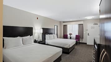 Una cassaforte in camera, tende oscuranti, ferro/asse da stiro