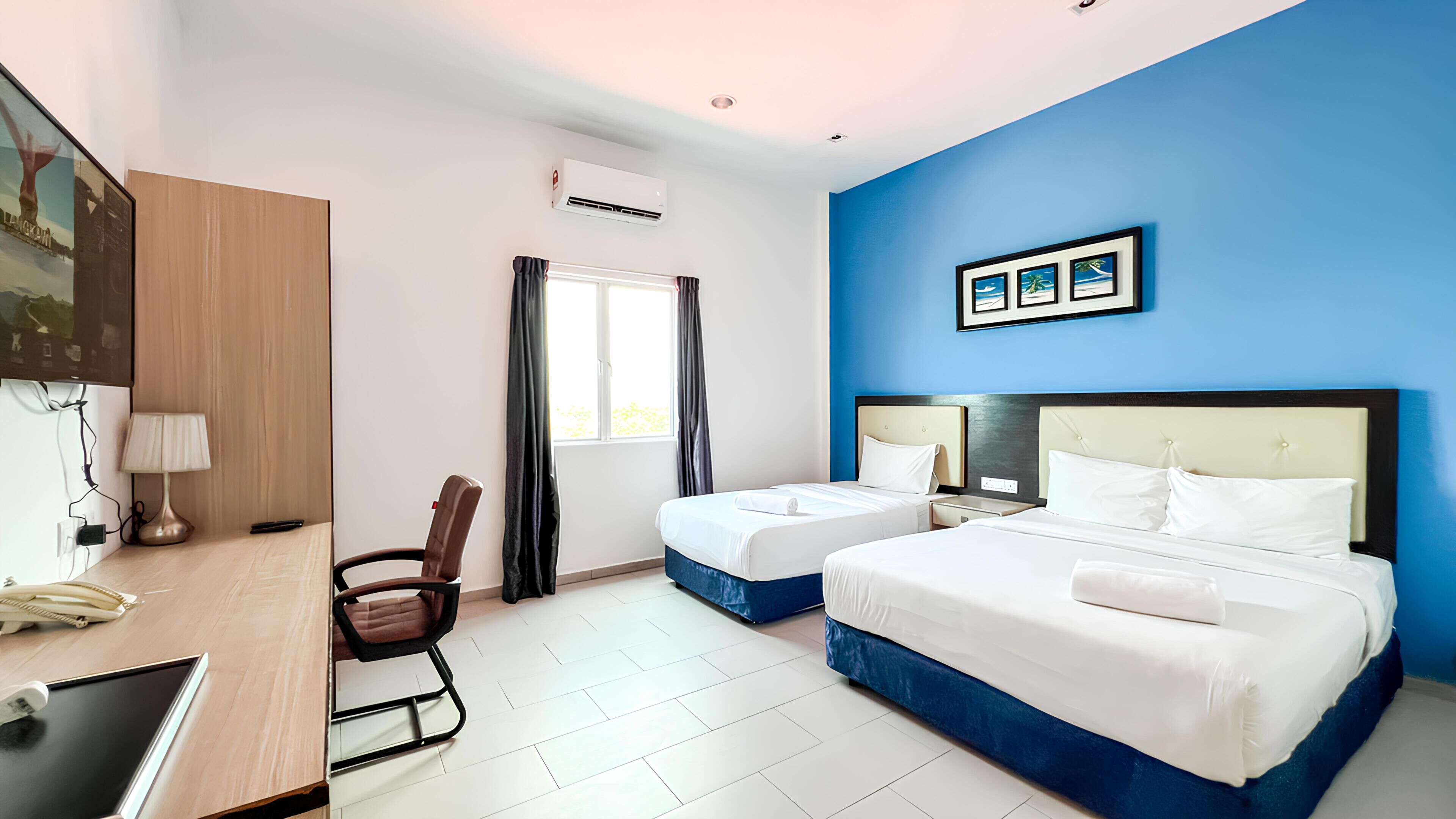 Familienzimmer (Deluxe) | Zimmersafe, Schreibtisch, Verdunkelungsvorhänge, kostenloses WLAN