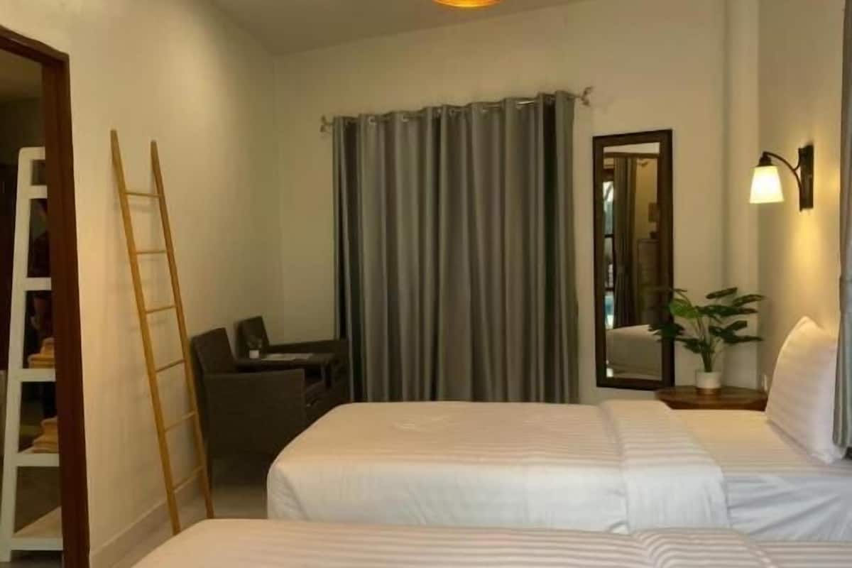 Interconnecting Pool View Room | Free minibar items, in-room safe, desk, blackout curtains