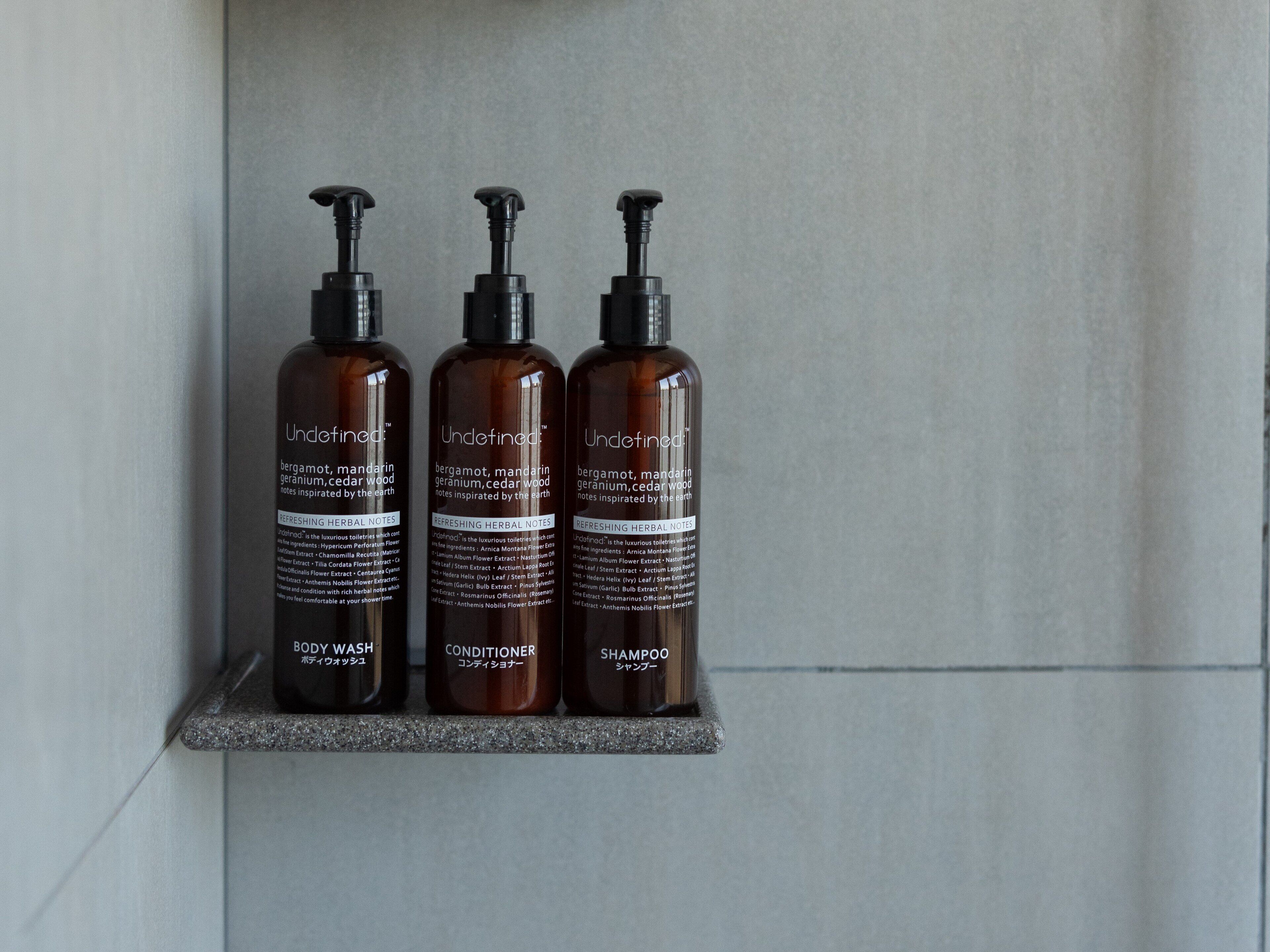 Shower, rainfall showerhead, designer toiletries, hair dryer