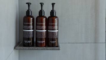 Shower, rainfall showerhead, designer toiletries, hair dryer