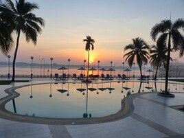 Outdoor pool, pool umbrellas, sun loungers