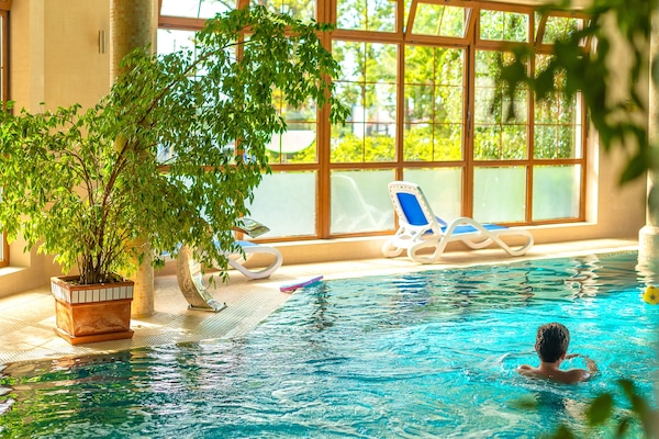 Indoor pool, open 7 AM to 10 PM, free pool cabanas, pool loungers