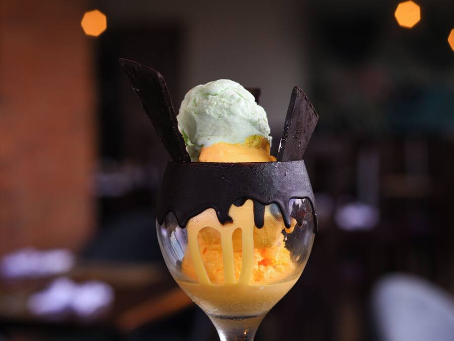 A dessert in a glass on a table.