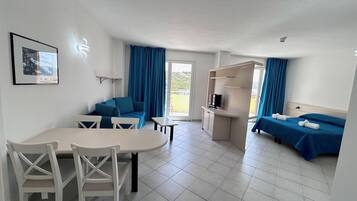 Family Room (Standard) | Memory-foam beds, minibar, in-room safe, desk